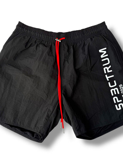 SP3CTRUM Archive Shorts in black with side logo detail — lightweight nylon active shorts, 5-inch inseam, women's gym and training wear, limited archive drop