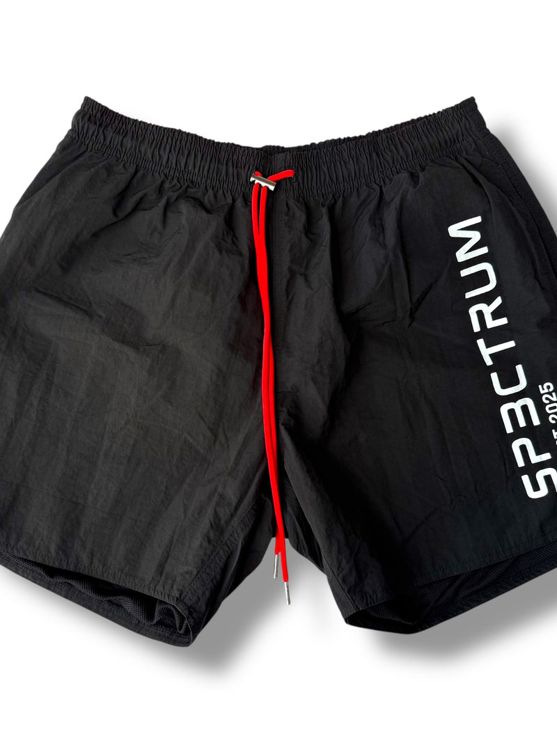 SP3CTRUM Archive Shorts in black with side logo detail — lightweight nylon active shorts, 5-inch inseam, women's gym and training wear, limited archive drop