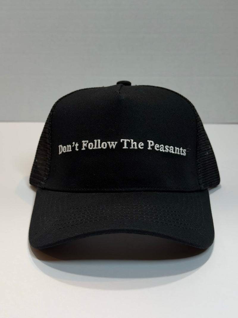 SP3CTRUM Trucker Hat black snapback — structured front panel with SP3CTRUM logo, front view, unisex adjustable athletic hat for gym and everyday wear