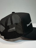 SP3CTRUM Trucker Hat black snapback — side profile view, structured crown, SP3CTRUM branding, unisex athletic and lifestyle headwear