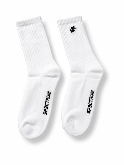 Layover Crew Sock 3-Pack — upright pair, SP3CTRUM wordmark on sole, puzzle mark on cuff