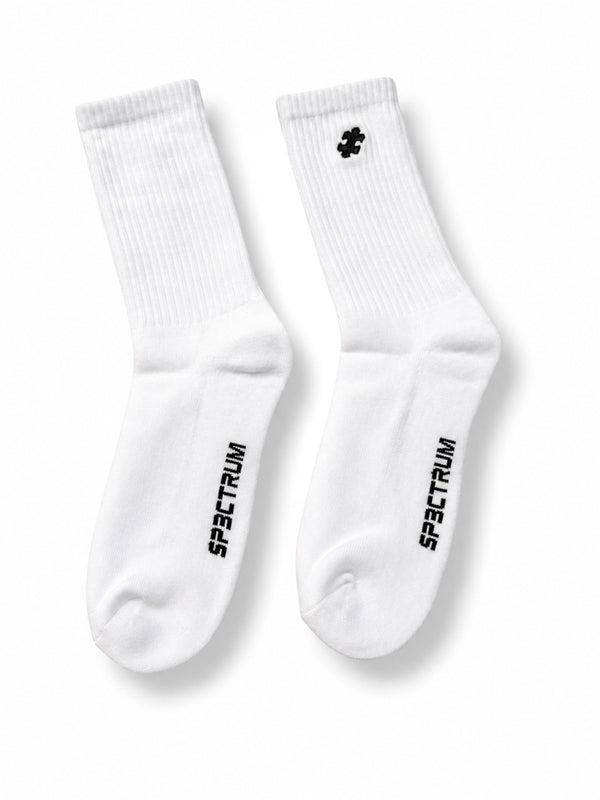 Layover Crew Sock 3-Pack — upright pair, SP3CTRUM wordmark on sole, puzzle mark on cuff