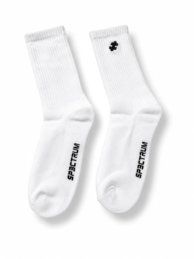 Layover Crew Sock 3-Pack — upright pair, SP3CTRUM wordmark on sole, puzzle mark on cuff